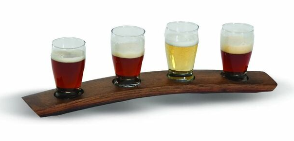 beer taster flight board made from wine barrel staves and four shot glasses