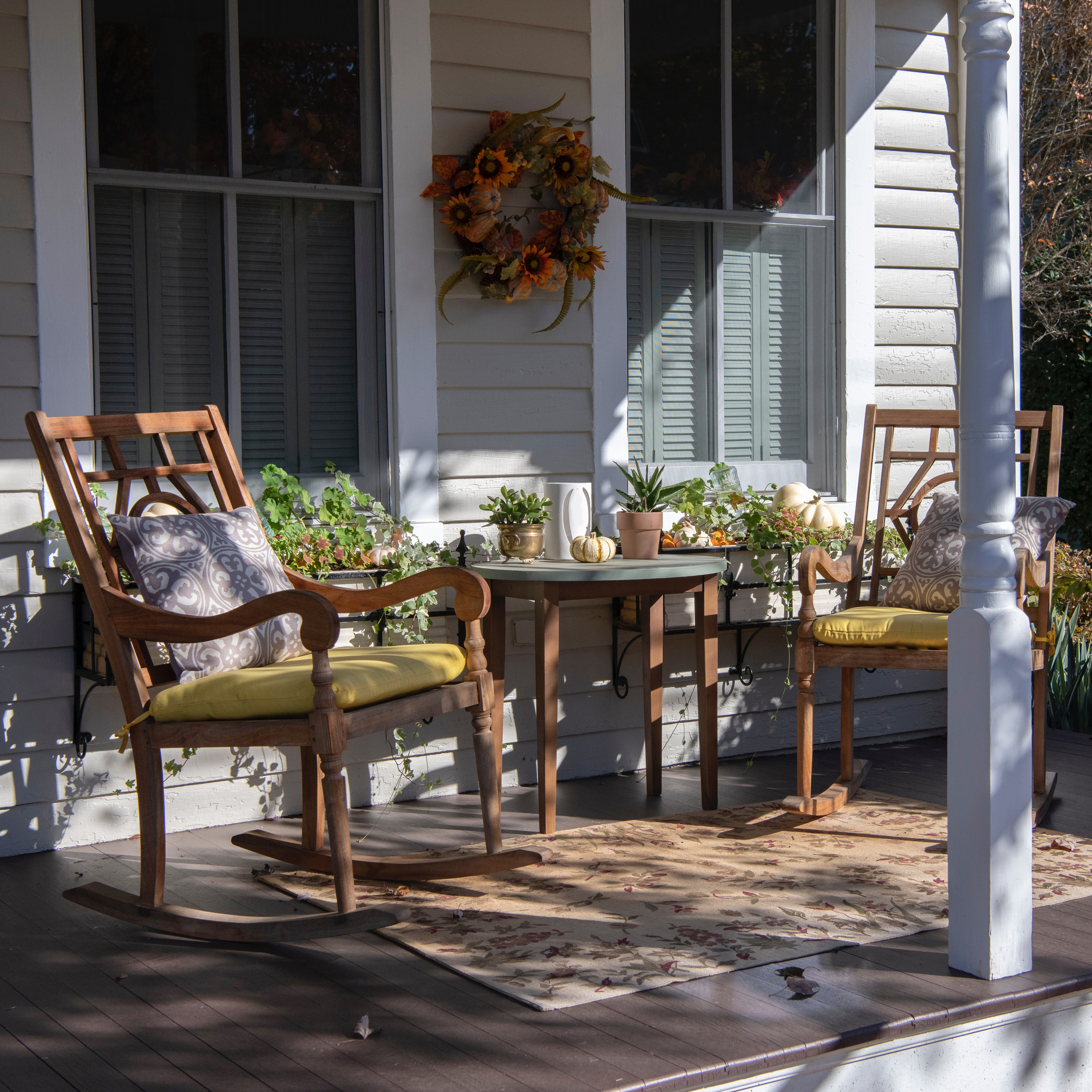 pretty porch with rocking chairs and small table