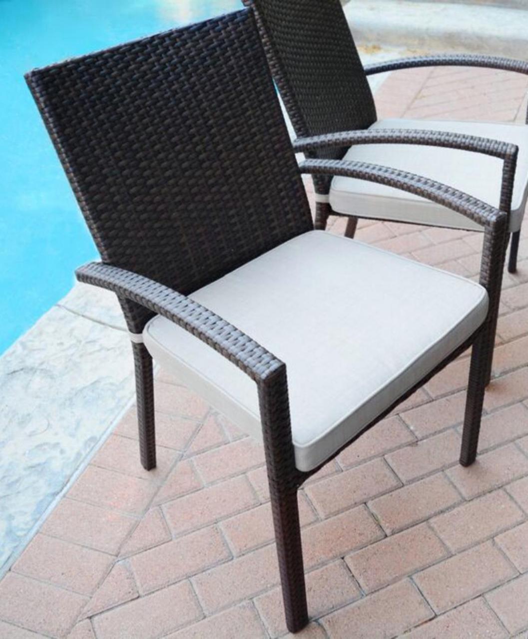 resin wicker patio chair by the pool