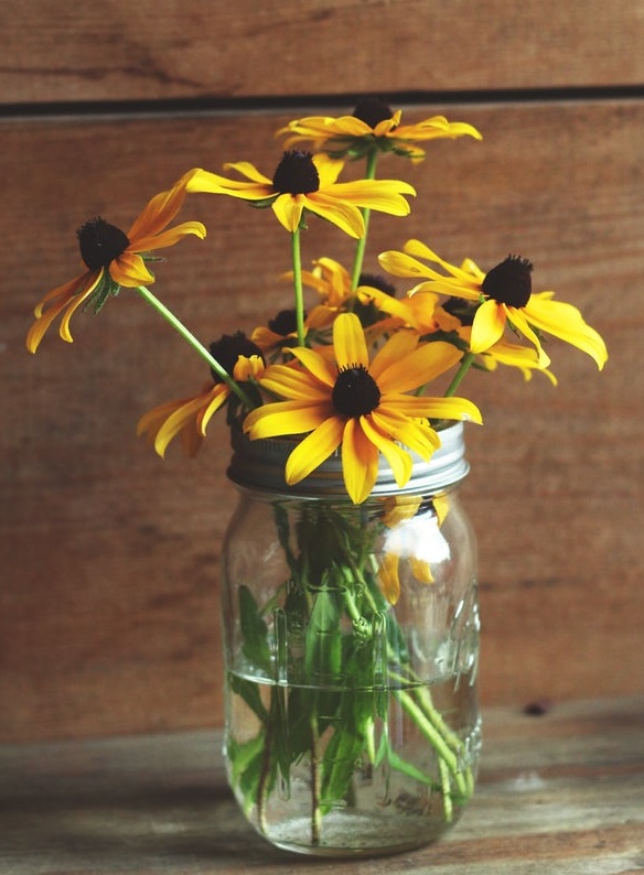 Sunflowers in Decorative Glass Vase