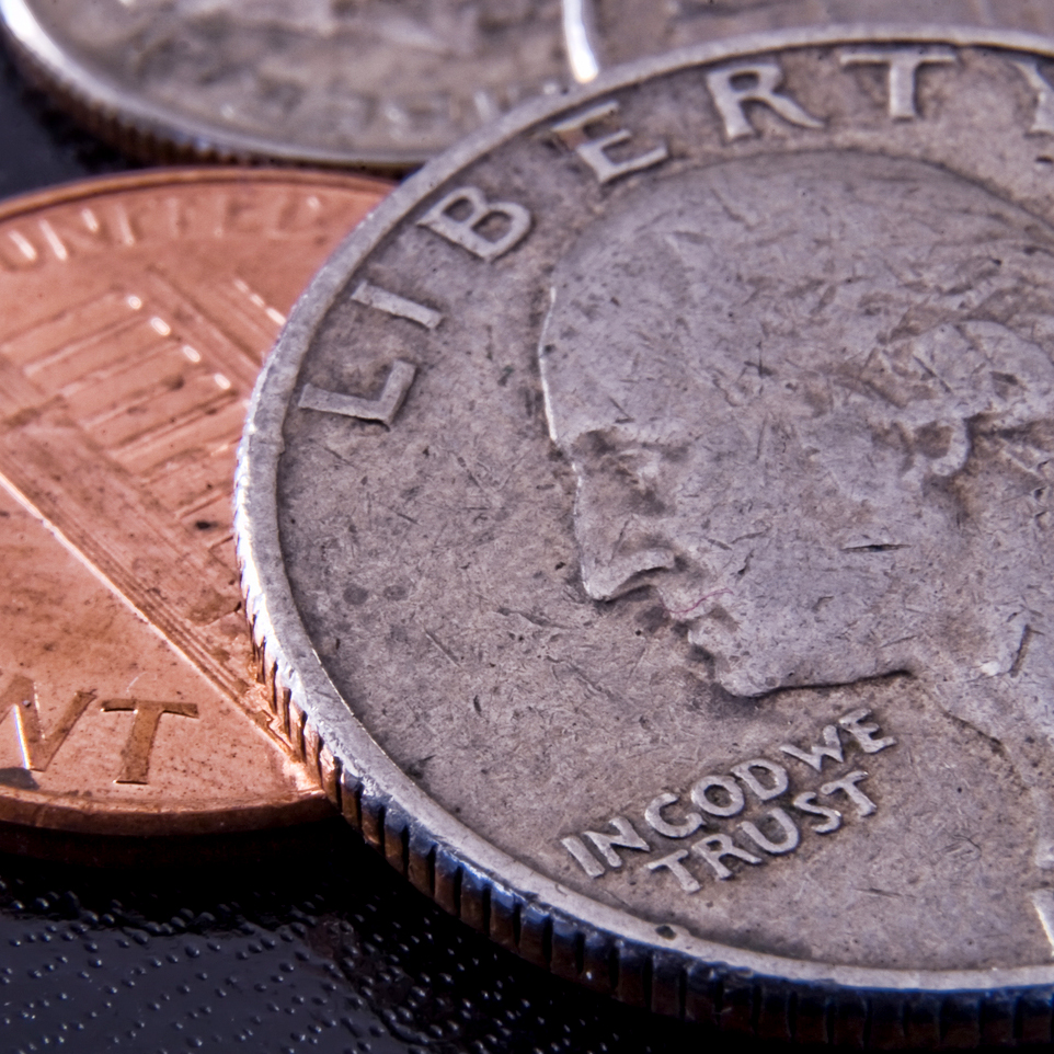 close up of American quarter, penny