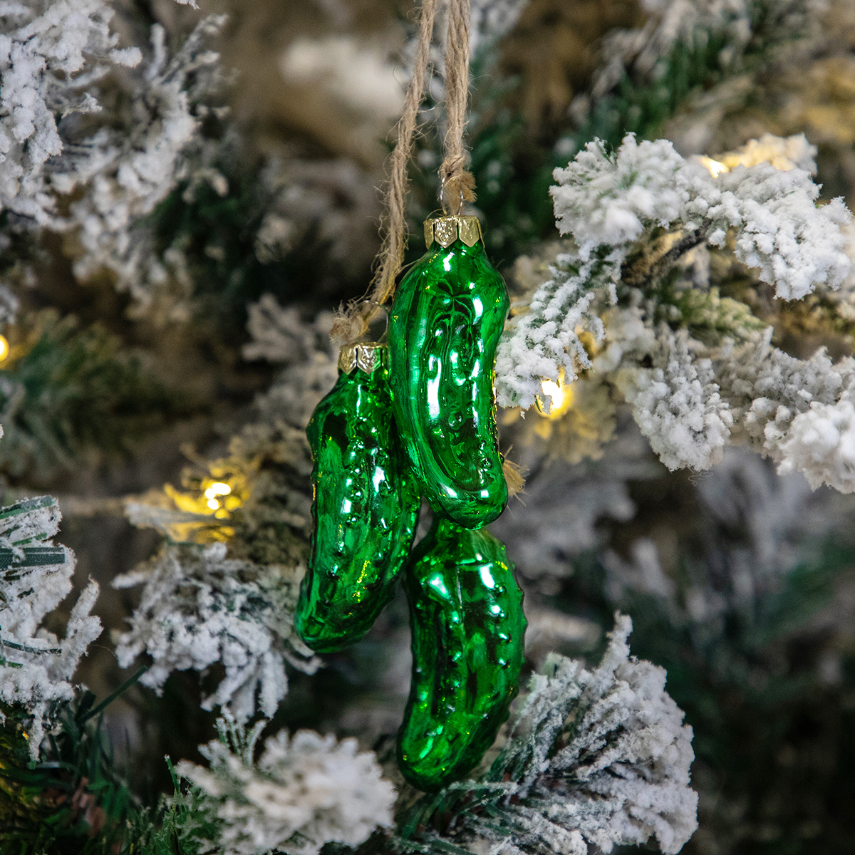 Three christmas pickle ornaments