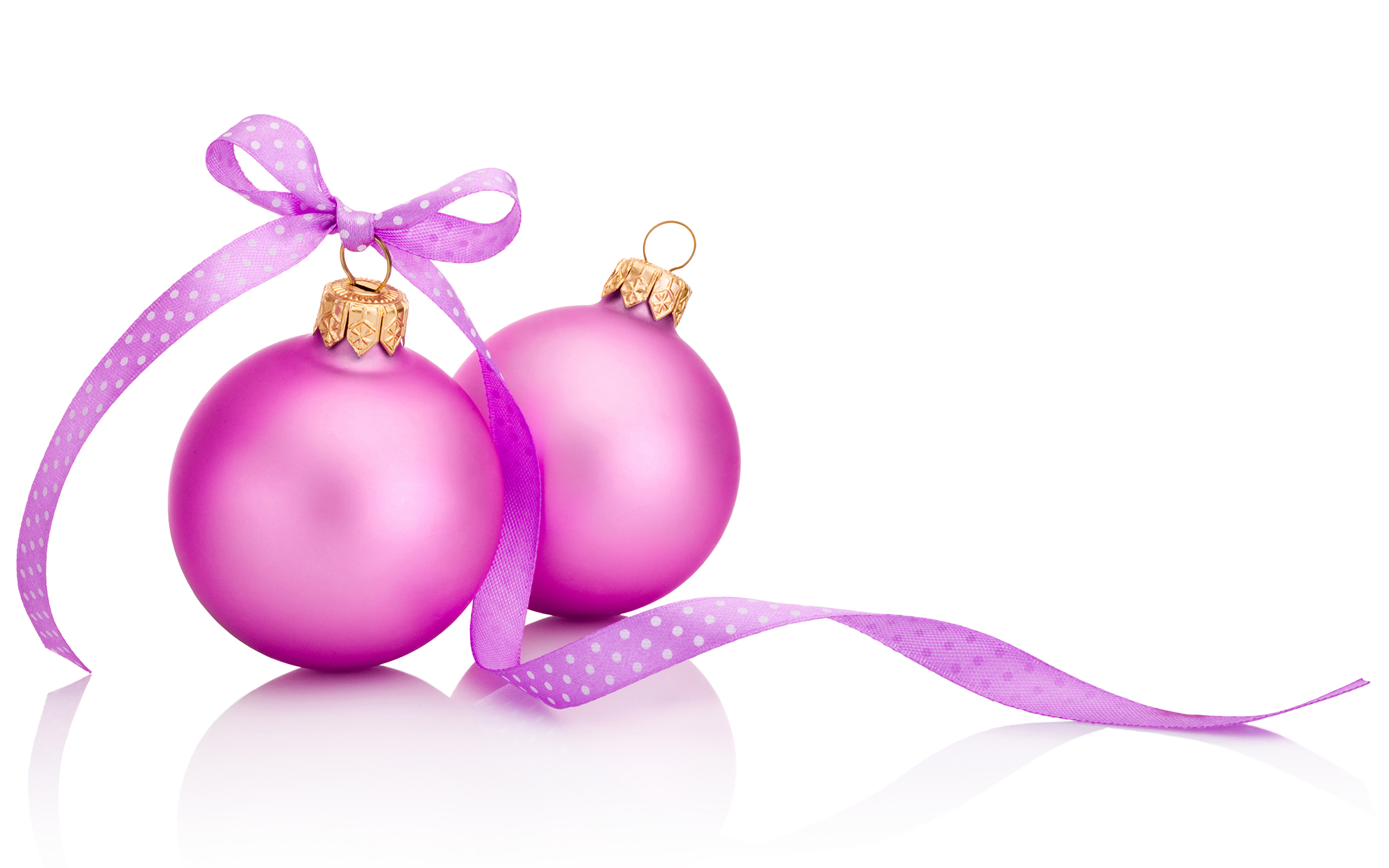 bright pink Christmas ornaments with pink polka dot ribbon